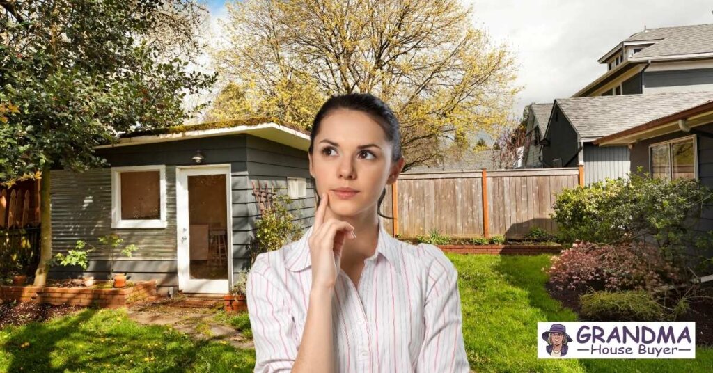 woman at home in sugar land tx in back yard pondering the foreclosure process and home selling options